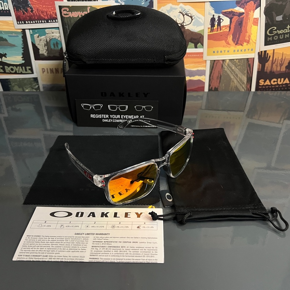 Oakley Sunglasses with Orange and Silver Accents